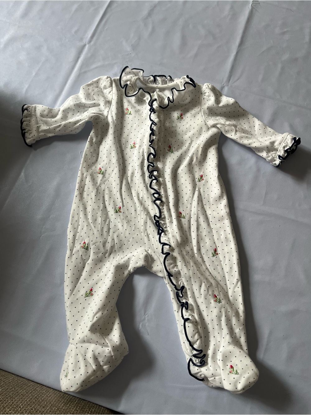Little Me White Footed One-Piece with Navy Ruffle Trim